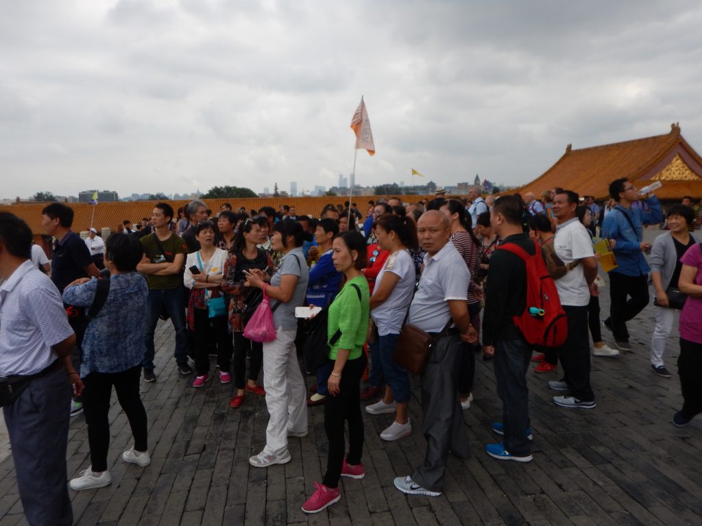 La foule et le Palais impérial de Pékin